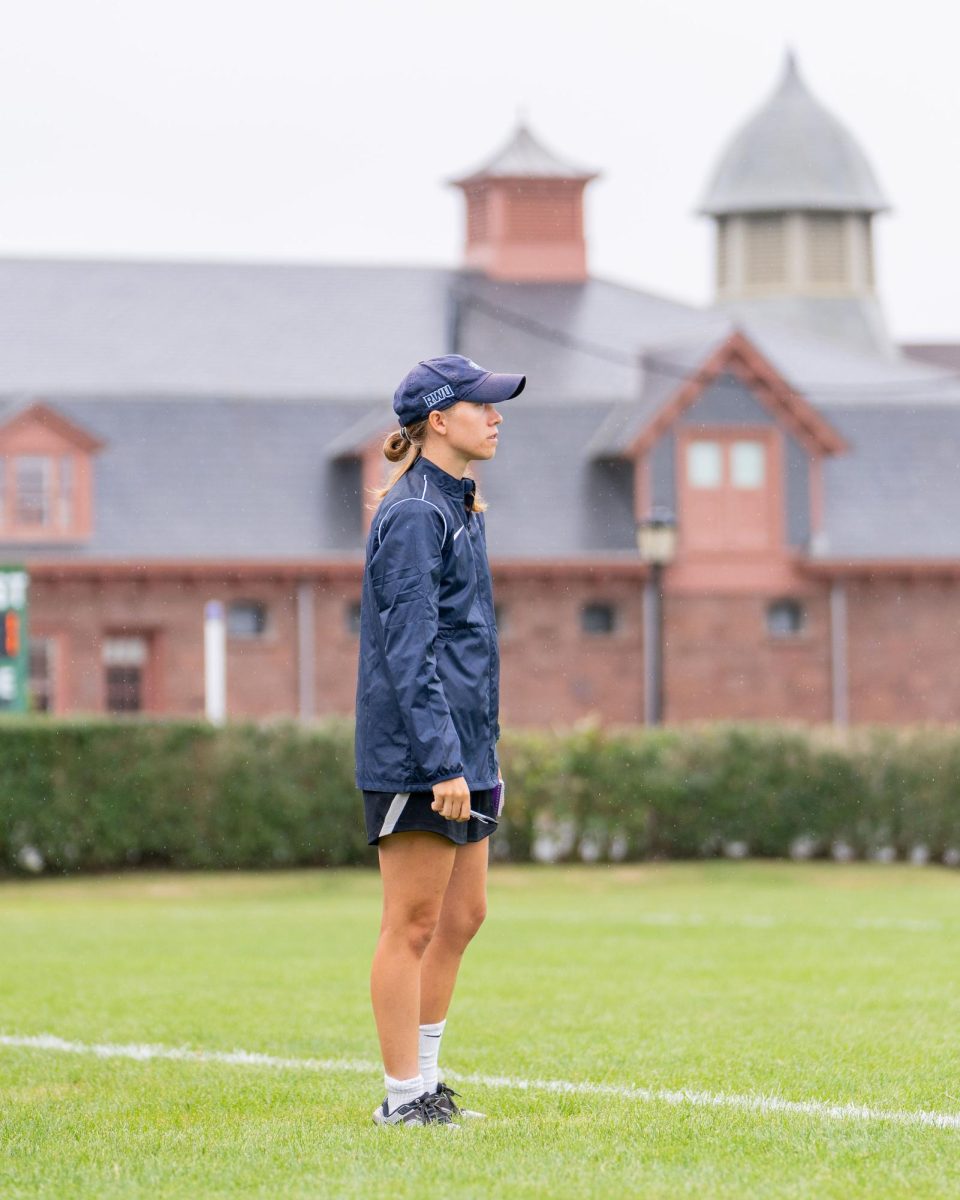 Abby Carchio coaches from the sideline at Robert Williams Athletics. Carchio was recently hired as an assistant coach for the women's soccer team. Photo courtesy Roger Williams Athletics.