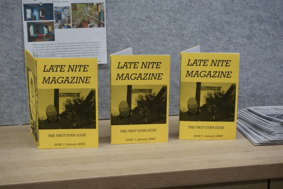 Three Late Nite magazines sit on display. The bright yellow cover and eerie image attracted many onlookers.