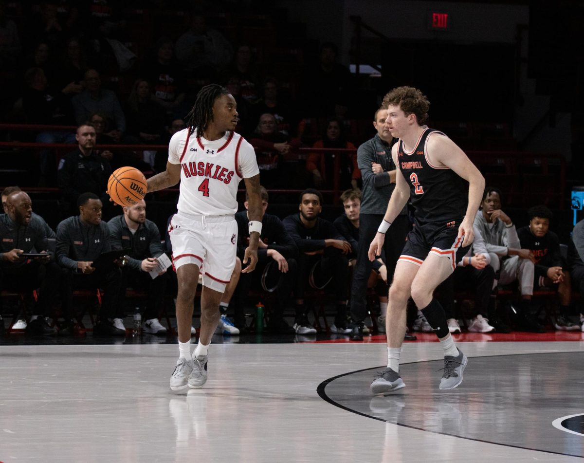 Rashad King dribbles patiently in front of his opponent Feb. 13. King was named NABC North Atlantic District First Team March 18 after being named All-CAA First Team March 6.