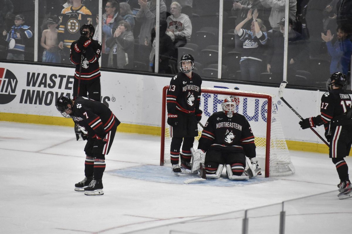 Northeastern mourns the loss. The Huskies lost to the Black Bears in double overtime 4-3.