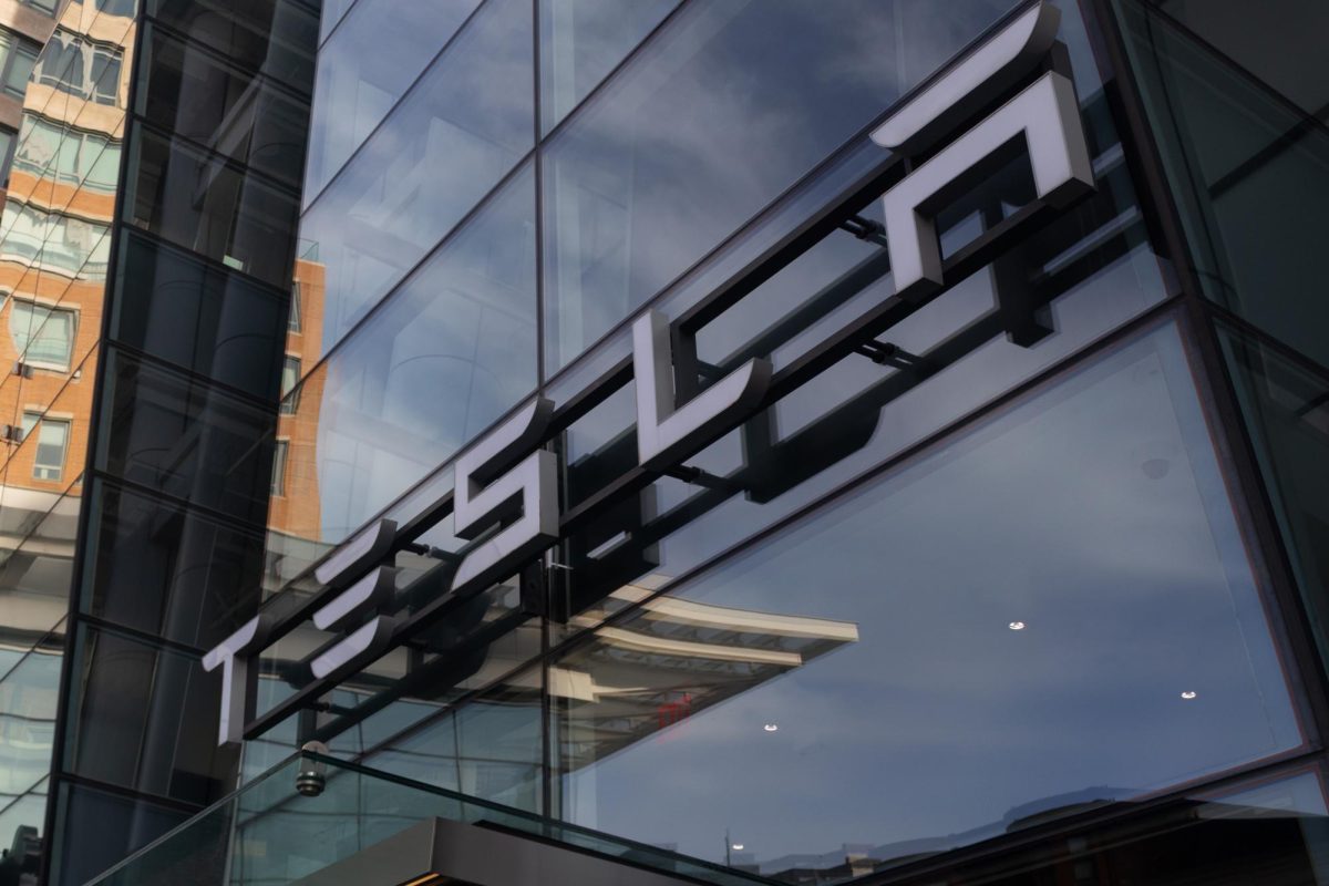 The Tesla showroom on Boylston Street. Protesters in Boston and across the nation started rallying for a boycott against Tesla products and stocks in response to Elon Musk's role in the Trump administration and leadership of DOGE.