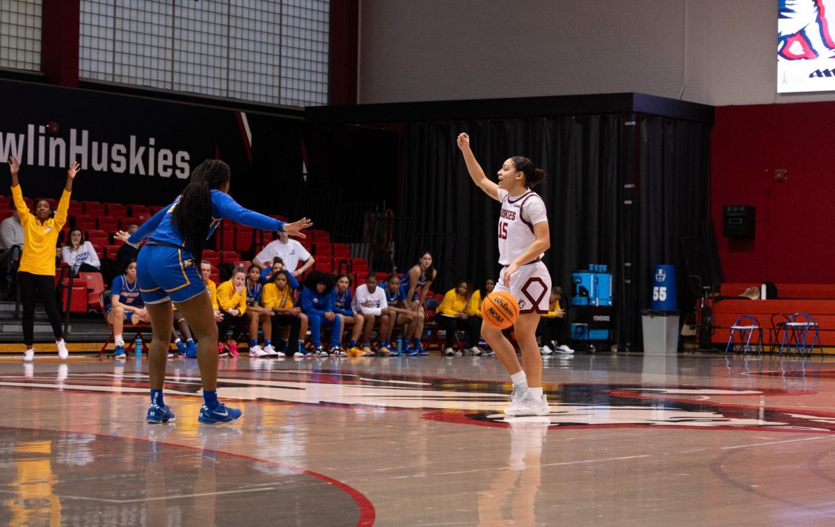 Yirsy Quéliz signals her team at a Feb. 16 game. The Huskies lost against William & Mary College Feb. 28 and Hampton University March 2.