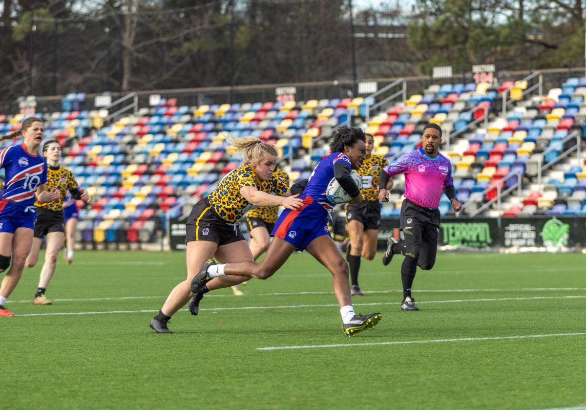 Kourtney Bichotte-Dunner runs down the field at the National Collegiate Rugby Women's All-star tournament. Northeastern womens' club rugby won national championships last season. Photo courtesy Margaret Reiss. 