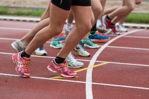 Runners wait to start their course. Two Northeastern female track athletes were disqualified at the CAA Championships for wearing illegal shoes Feb. 26. Photo courtesy Pexels.