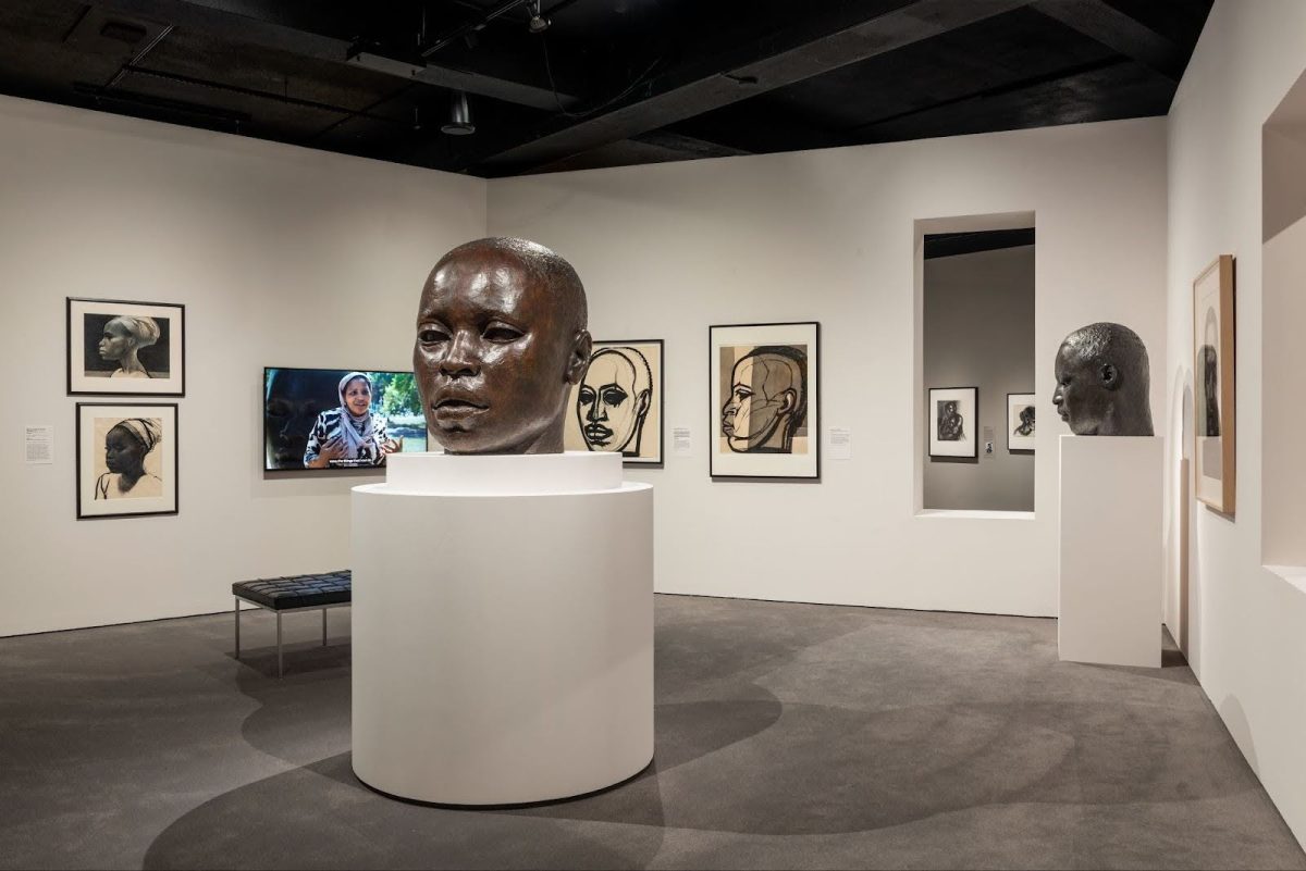 The “Witnessing Humanity: The Art of John Wilson” exhibit in the Lois B. and Michael K. Torf Gallery. Wilson utilized a combination of realistic sculpture and figure drawings to portray his subjects. Photo courtesy Museum of Fine Arts, Boston.
