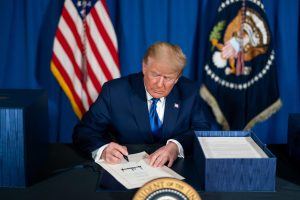 President Trump signs the Consolidated Appropriations Act Dec. 27, 2020. Throughout his second term, several American universities and colleges faced unprecedented governmental pressures and demands, including Northeastern. Photo courtesy Trump White House Archived