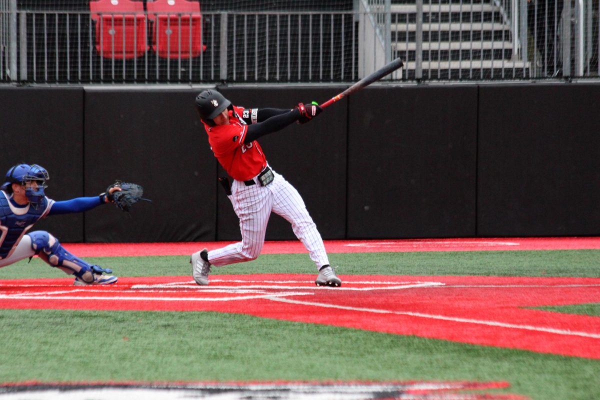 Carmelo Musacchia swings against Hofstra April 13. Musacchia played a major role in the Huskies sweep over Monmouth April 25 to 27.