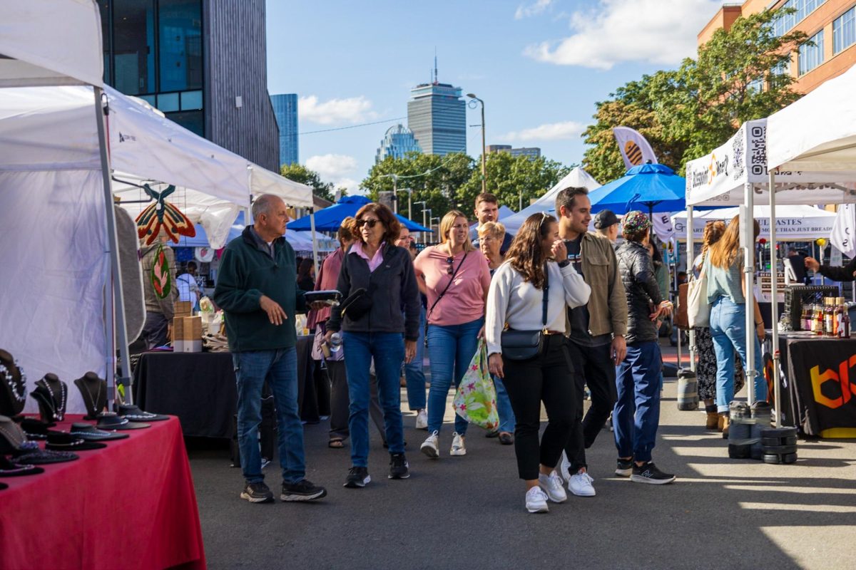 Customers peruse the stands at last year's SoWa Open Market.