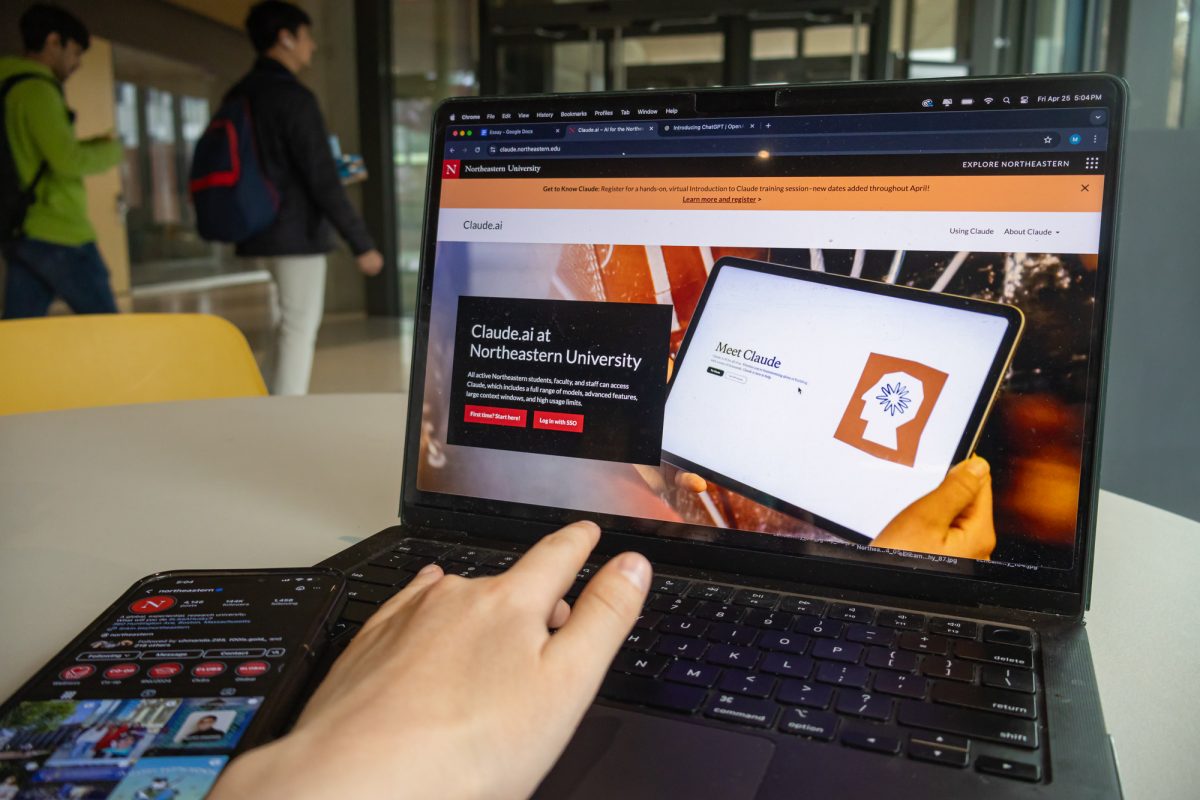A student navigates Northeastern’s Claude AI webpage on a laptop. The university offered virtual workshops and livestream tutorials that taught students how to incorporate Claude into their academic studies.
