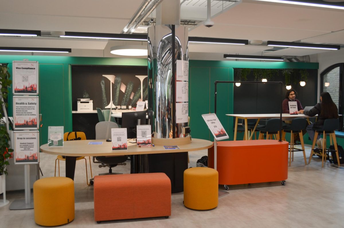 Students gather in the First Point Lounge on the NU London campus in February 2024. NU London altered its DEI website title to "Belonging at Northeastern" and annual report to the "Belonging Report" in March. Photo courtesy Ahana Sinha.