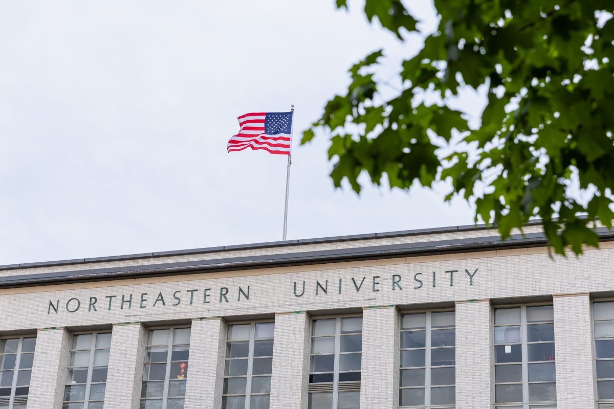 An American flag flies above Ell Hall May 28. Students reflected on how an unprecedented political climate has reshaped their Fourth of July expectations this year. 