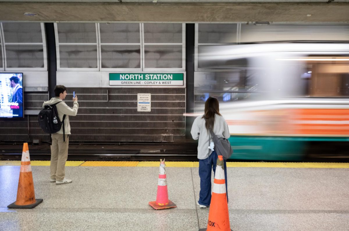 People wait for the Green Line at North Station Sept. 15. Read more here.
