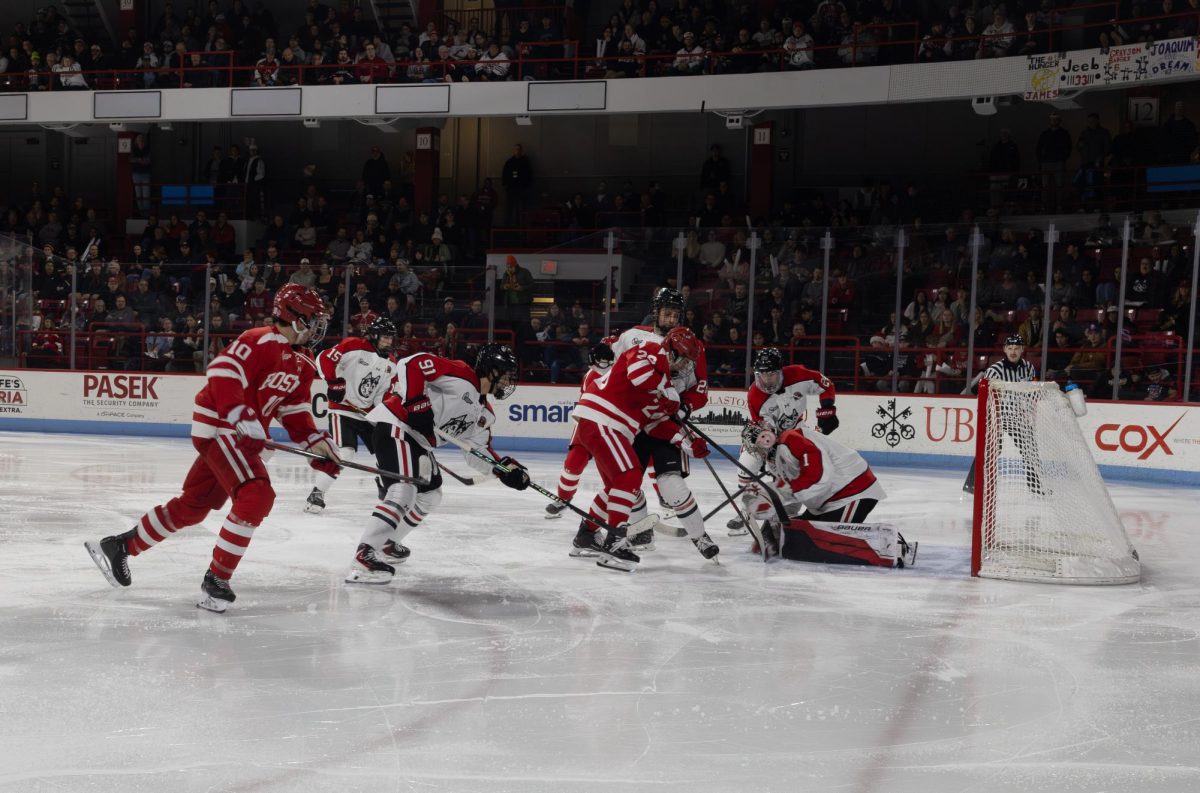 Sophomore goaltender Quentin Sigurdson saves the puck during a game against Boston University Nov. 21. Read more here. 