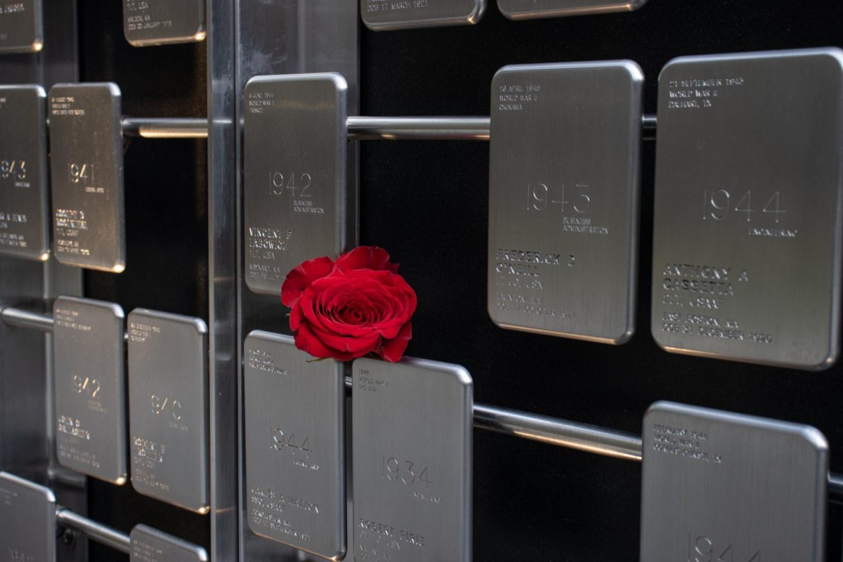 A red rose sits on commemorated steel plates at the Northeastern Veterans Memorial Nov. 11. Read more here.