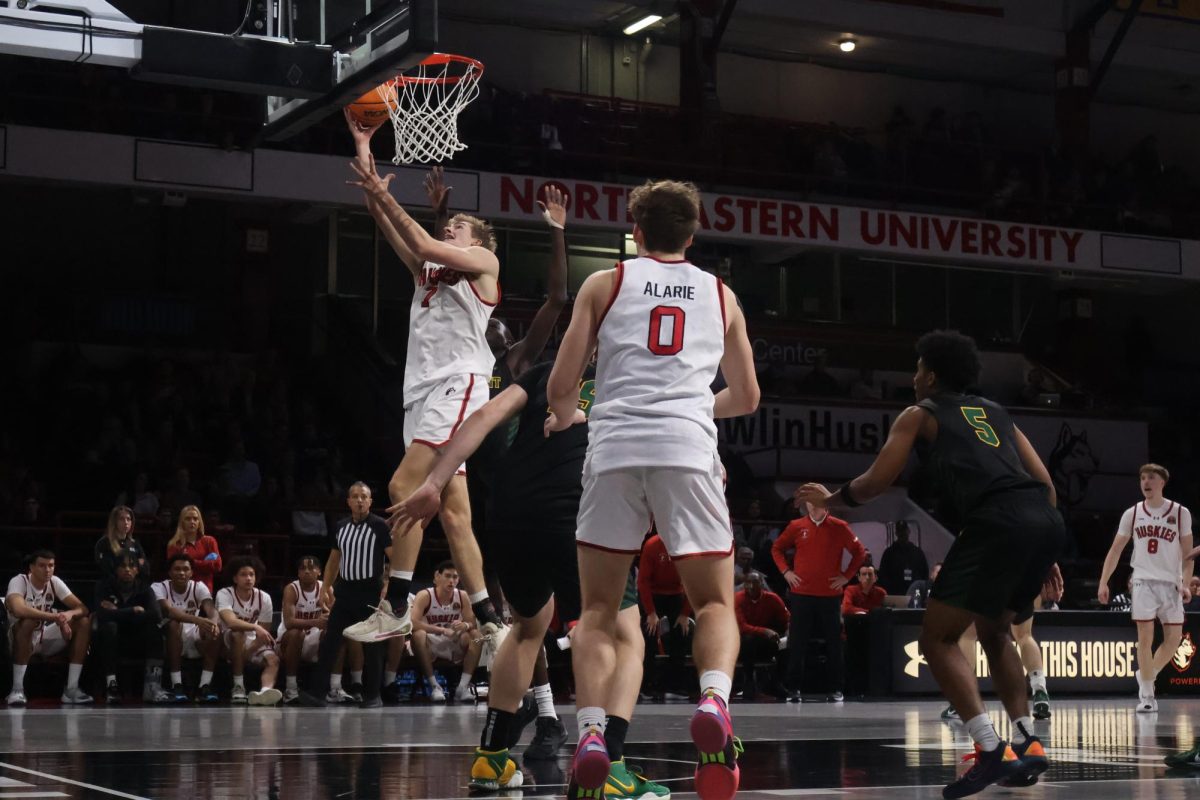 Youri Fritz goes up for a layup Nov. 15. Fritz collected five points in the 76-59 loss to Holy Cross Dec. 3.