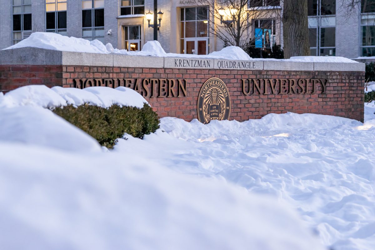 Northeastern University signage on Krentzman Quad framed by snow Jan. 31. CNN reviewed an internal memo that lists the university as having a "moderate to high risk" chance of losing military tuition assistance.