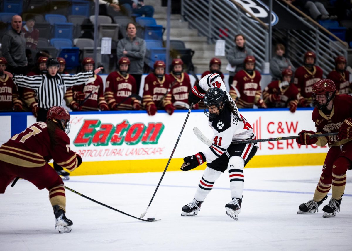 Senior defender Jules Constantinople tries to keep the puck away from BC. The Huskies lost 1-0 to the Eagles in overtime Feb. 15.