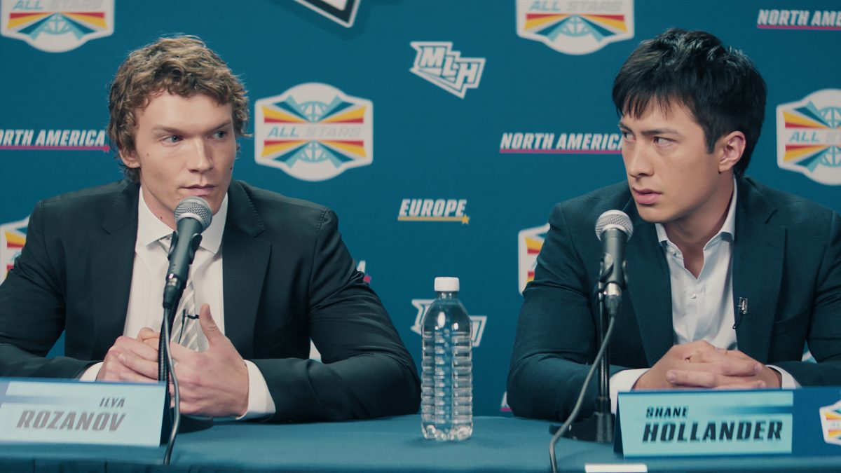 Ilya Rozanov (Connor Storrie, left) and Shane Hollander (Hudson Willams) answer questions at a post-game press conference. “Heated Rivalry” became a catalyst for bringing queer representation into mainstream media. Photo courtesy Sabrina Lantos, HBO Max.
