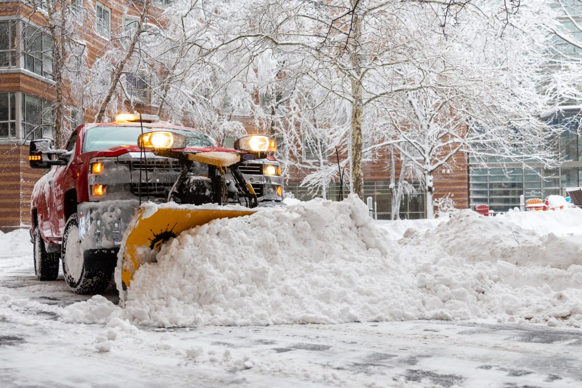 A snow plow clears out the West Village Quad walkway Feb. 23. Read more here.