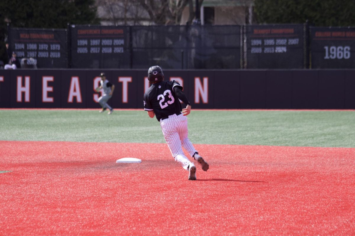 Senior shortstop Carmelo Musacchia runs to second base March 22, 2025. Musacchia earned three hits in the series against Stony Brook March 6 to 8.