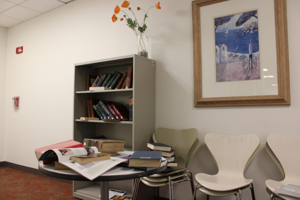Books rest on a table and shelf in the Northeastern School of Law building Feb. 25. The Civil Rights and Restorative Justice Project assisted in overturning the original 1953 verdict of the wrongfully executed Tommy Lee Walker.