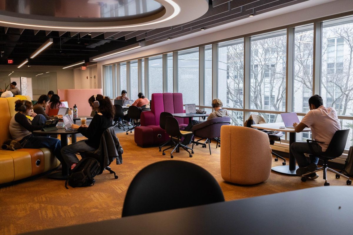 Students study in Snell Library March 13. Students mentioned disinclination towards studying in Snell, highlighting places off-campus more crucial to their academic success.