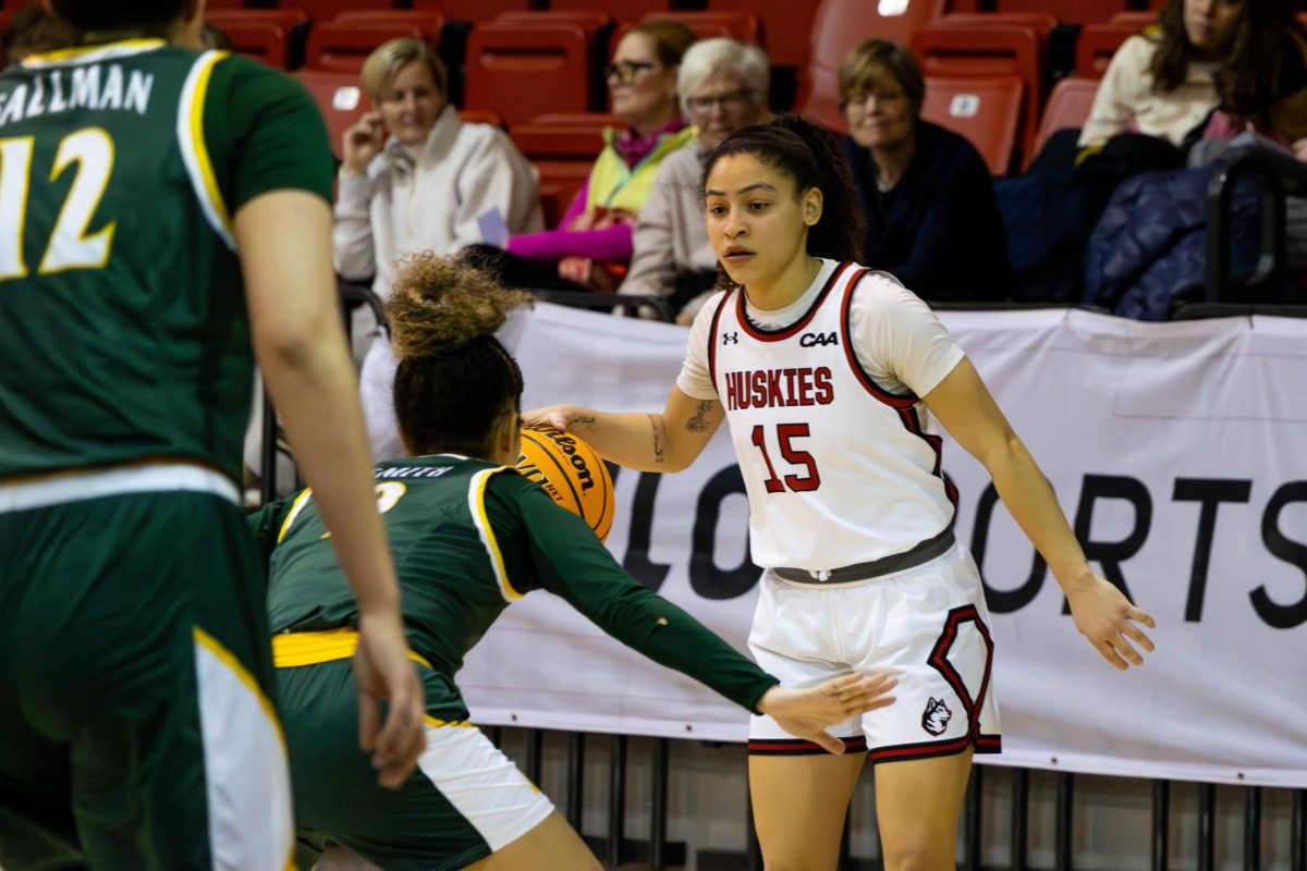 Junior guard Yirsy Quéliz approaches her William & Mary opponent Jan. 23. Quéliz held the most 3-pointers, assists and minutes on the team.