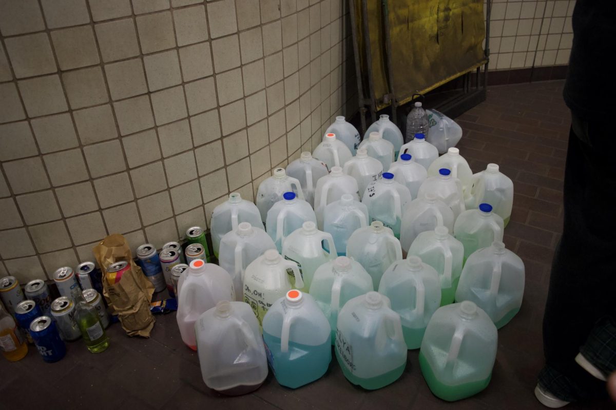 Multiple BORGs and alcoholic beverages sit against the Downtown Crossing Red Line station walls March 15. This year, law enforcement increased crowd control efforts to reduce alcohol-related accidents and disorderly conduct.