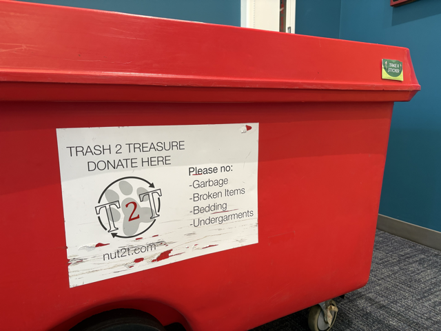 A “Trash 2 Treasure” donation bin sits inside a campus building April 16. The program encourages students to donate reusable items.