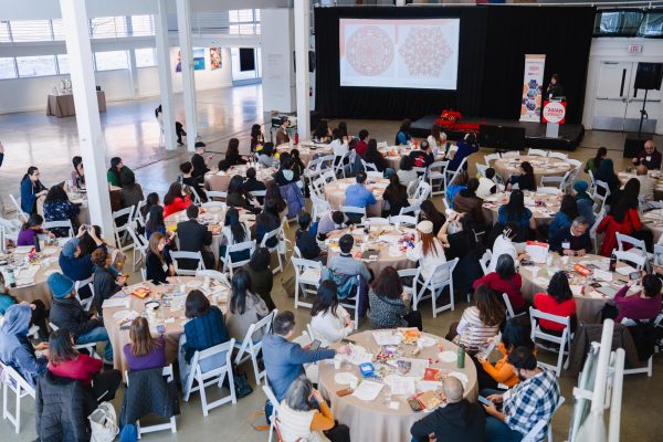 Community members sit and listen as Elena Li speaks about intricate paper art during the AAPI Arts & Culture Summit Jan. 30. ACF granted $115,000 to be split among 13 artist winners in honor of AAPI month. Photo courtesy Brightside.