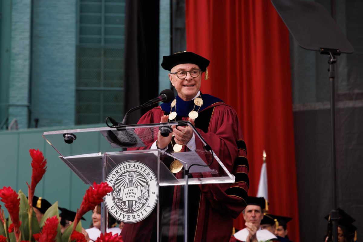 Joseph E. Aoun addresses the crowd of Class of 2026 graduates during commencement April 29. Aoun received over $2 million for the fourth year in a row.