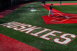The Huskies warm-up before their game against Towson March 14. BetMGM listed Northeastern baseball's game against Campbell University on its app last year, resulting in a fine.
