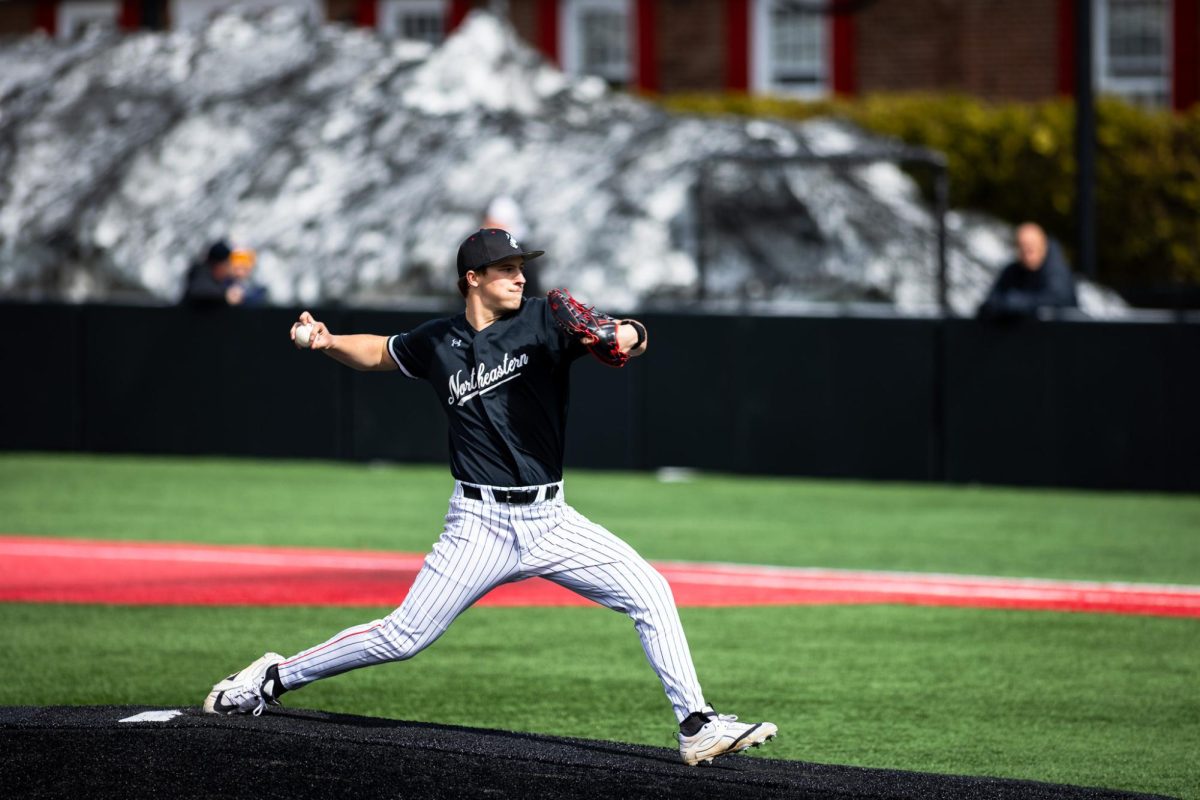 Right-handed pitcher Luc Rising launches the ball from the mound against Towson March 14. Rising was selected by the Los Angeles Angels in the 10th round of the MLB Draft.